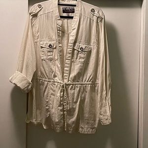 Ivory utility jacket, open front closure with tie, no buttons, no zipper.
